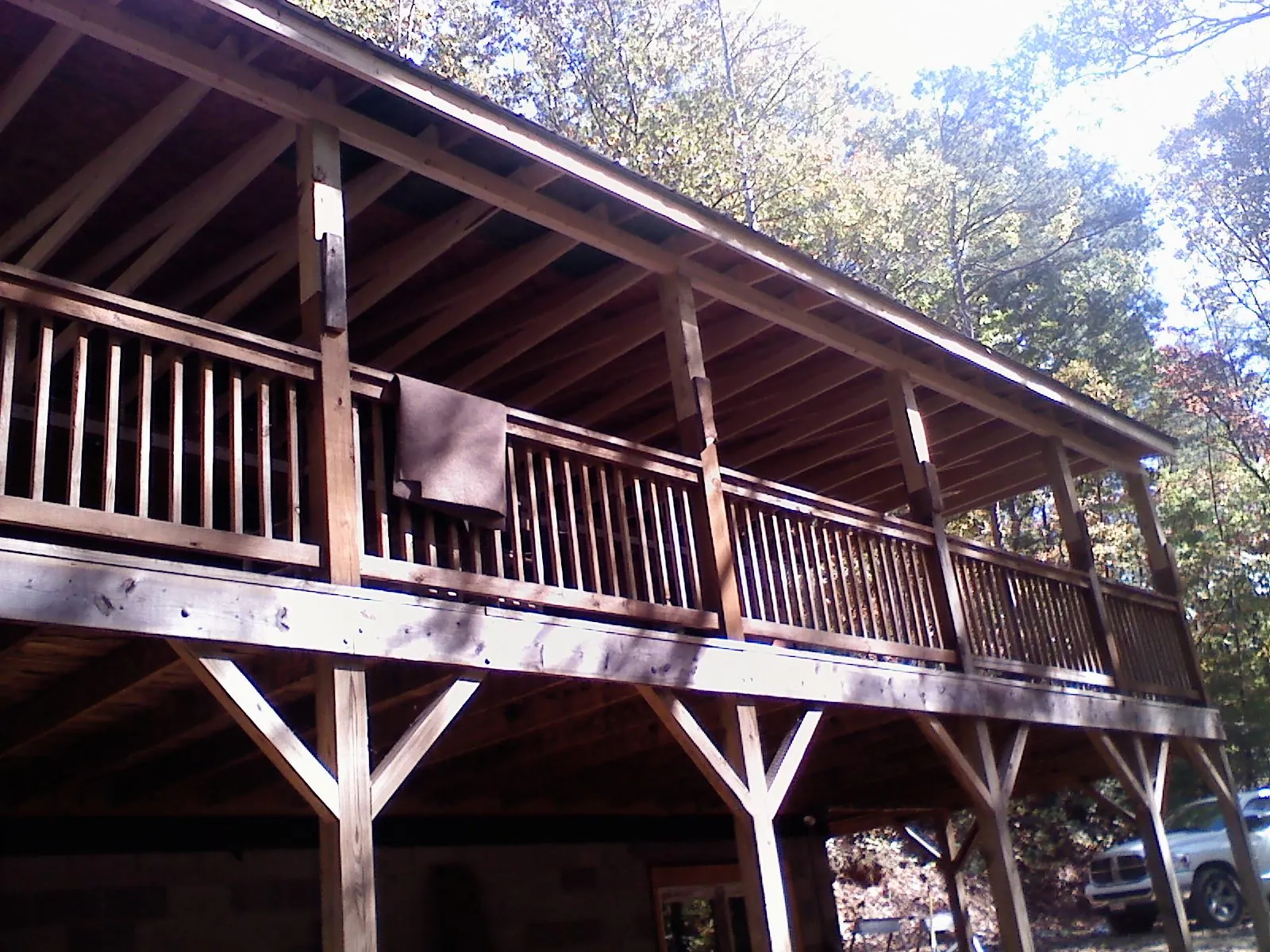 Timber framing under a new elevated porch and deck — Roof Leak Repair in Euclid by Roofing Brothers